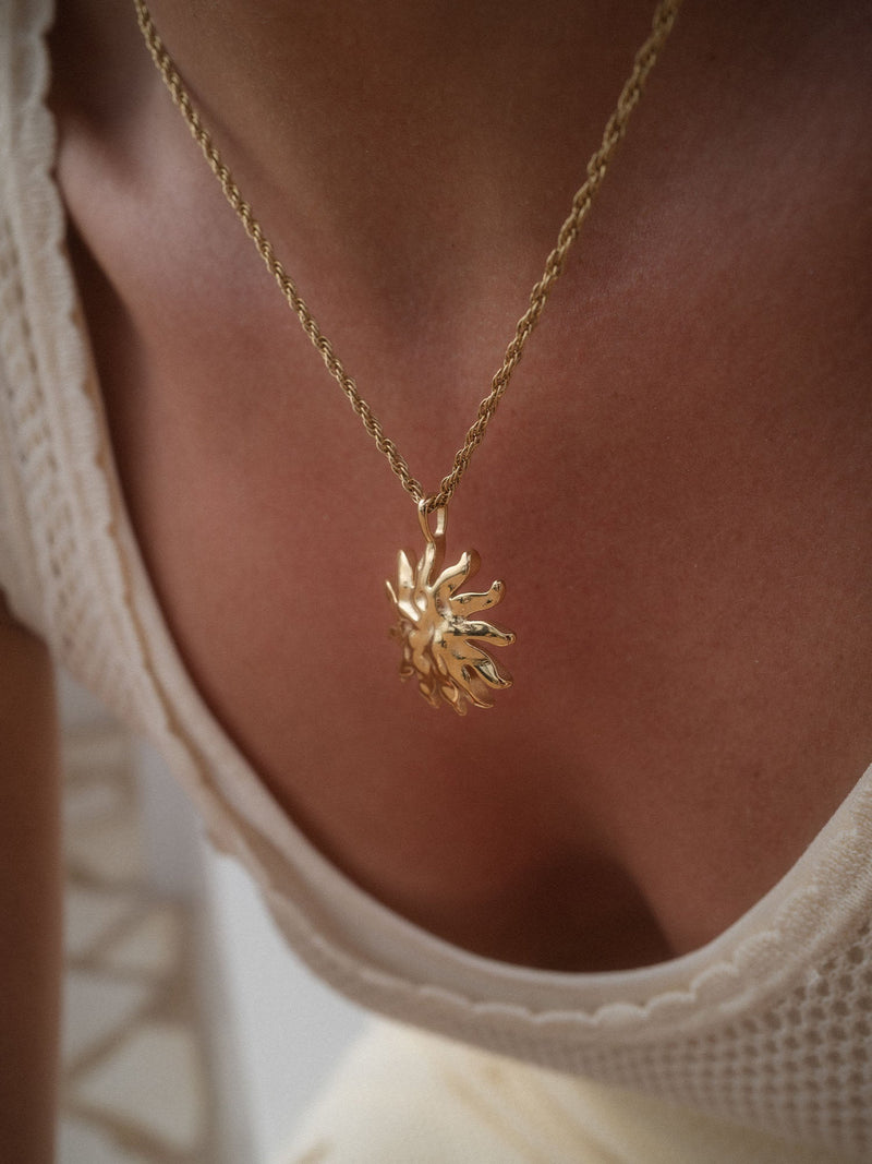 Iconic Sun Charm
